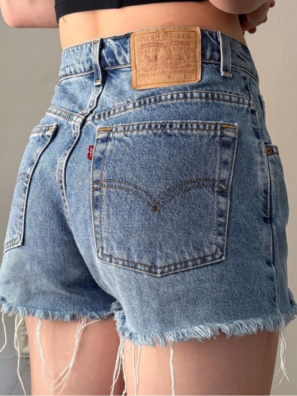 Vintage 90s Levi’s high rise relaxed fit cutoff denim shorts